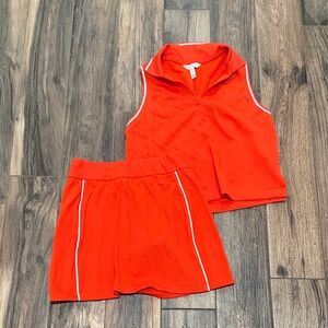 SPANX Bright Orange/Red Sleeveless Polo Top and Matching Skirt with White Piping